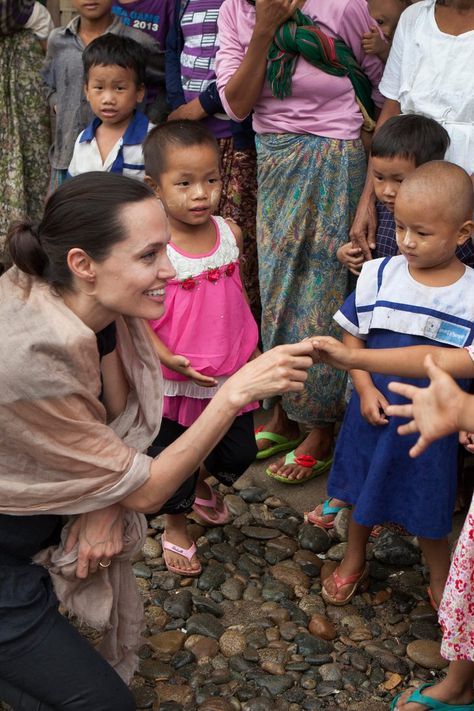 6 Impactful Ways Angelina Jolie Is Making a Difference in the World #PopSugar Unicef Angelina Jolie, Angelina Jolie Helping People, Angelina Jolie Humanitarian Work, Angelina Jolie Unicef, Angelina Jolie Humanitarian, Charity Work Aesthetic, Angelina Jolie Charity, Humanitarian Aesthetic, Charity Aesthetic