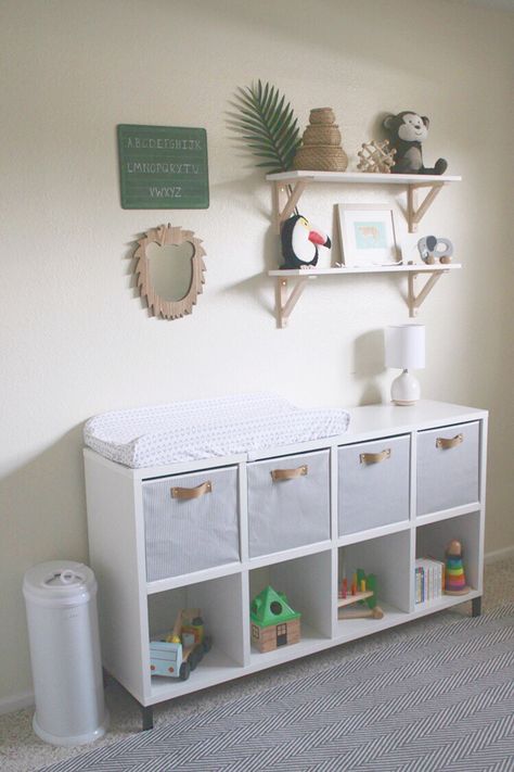 Neutral jungle nursery, green, natural, nursery shelves, cubby shelf, changing table Cube Storage As Dresser Nursery, Kallax Change Table, Diy Nursery Changing Table, Cubby Changing Table, Storage Cube Changing Table, Bookshelf Changing Table, Cube Shelf Changing Table, Nursery Cube Organizer Ideas, Green And Natural Nursery