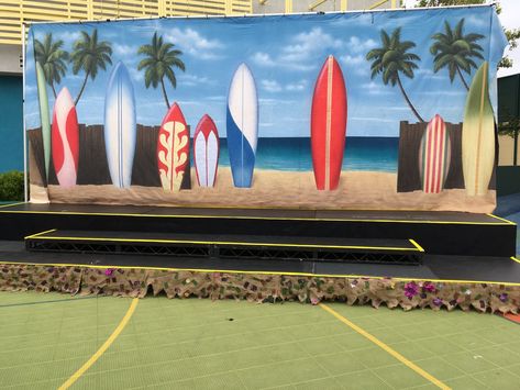 An outdoor stage for summer camp. Celebrations and musical theater. Beach and surf themed. • #scenic #scenicdesign #stagedesign #summercamp #summercamptheme #surf #surfing #backdrop #backdrop #youththeater #theater #theatre #outdoorstage #stage #onstage #paintedscenery #scenery #stagedesign #theatrekids #theatre #camptheme Summer Props, Summer Lounge Set, Set Theatre, Ceramic Paint Palette, Summer Camp Themes, Pottery Artist, Outdoor Stage, Youth Theatre