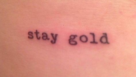 Stay gold tattoo. Just a reminder to never forget your youth and your innocence and the brilliant curiosity that comes with it. Embrace the beauty that life brings us, always be true to yourself, and follow your dreams. Never lose your heart. Like Johnny said, "Stay gold, ponyboy." Stay Good Tattoo, Stay Golden Tattoo, Stay Gold Ponyboy Tattoo, Stay True To Yourself Tattoo, Everything Stays Tattoo, Nothing Gold Can Stay Tattoo, Stay Gold Necklace, The Outsiders Tattoo, Stay Gold Tattoo The Outsiders