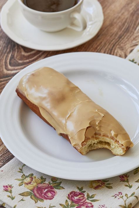 Maple Bar Donut Recipes Maple Cake Donut Recipe, Maple Long Johns Recipe, Coffee Donut Recipe, Maple Donut Bars, Keto Maple Donut, Maple Bar Frosting, Sourdough Maple Bars, Maple Bar Donut Recipe, Long Johns Donuts Recipe