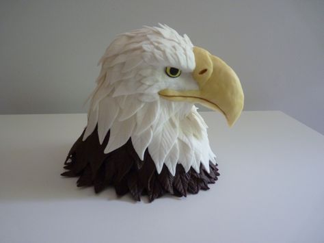 - Made this eagle to place on top of another cake for an Eagle Scout ceremony.  The head is made of RCTs covered in chocolate candy clay feathers.  I made the beak with RCTs and attached using dowel rods, covered it in yellow candy clay.  Eyes made of fondant. Mermaid Diy Crafts, Patriotic Cakes, Clay Feathers, Eagle Scout Cake, Clay Eyes, Marine Cake, Eagle Scout Ceremony, Patriotic Cake, Eagle Project