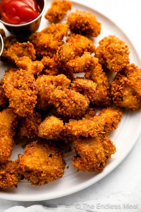 These tender bites of popcorn chicken are coated in smoky chipotle flavor and then crusted in panko crumbs before being fried to crispy perfection. Serve them with a simple honey mayo sauce on the side for dipping and everyone from your kids to your party guests will love these! #theendlessmeal #appetizer #partyfood #chickenrecipes #littlebites #chicken Panko Chicken Tenders, Crumbed Chicken, Chicken Crisps, Popcorn Chicken Recipe, Air Fryer Recipes Dessert, New Chicken Recipes, Chicken And Chips, Mayo Sauce, Crispy Chicken Tenders