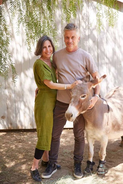 brooke and steve giannetti with one of their donkeys patina farm-ageless style interview-i-cindy hattersley design #fashionover50 #agelessstyle #over50fashion A Pattern Language, Cindy Hattersley, Patina Farm, Downtown Santa Barbara, Patina Style, Dream Farm, Interior Decorating Tips, Farm Lifestyle, Living Books