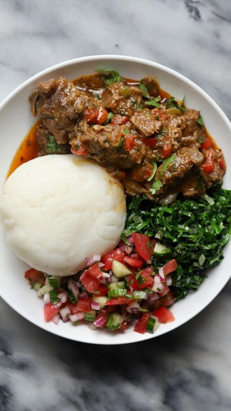 Kenyan Goat Wet Fry, Sukuma Wiki, Kachumbari and Ugali - Travelandmunchies Ugali Sukuma Wiki, Kenyan Recipes Dishes, Dinner For My Husband, Kachumbari Recipe, Ugali Recipe, Kenyan Dishes, Sukuma Wiki, Kenyan Recipes, South American Food