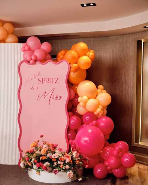 Aperol Spritz Themed Bridal Shower- Her Last SPRITZ as a MISS 🍹 🍊 We really love this theme! It was a pleasure working with you, Vicki! You and your guests were STUNNING! 🧡 • • • Backdrops, All Balloons & Backdrop Flowers: @decorandvibes • Backdrop Decal: @signedbytobs • Photographer: @samuelbass • • #ottawa #orange #hotpink #balloongarland #613 #ottawaevents #bridalshower #bridetobe #aperolspritz #aperolspritztheme #pink #fuschia #ottawabridalshowers #ottawaeventdecor #sohochampagne #ot... Hens Balloons, Orange Pink Party Theme, Pink Orange Backdrop, Pink And Orange Hens Theme, Aperol Spritz Bridal Shower Theme Backdrop, Orange Pink Decor, Pink And Orange Bachelorette Party Theme, Aperol Spritz Hen Party, Pink Orange Bridal Shower Theme