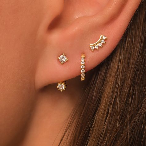 Dainty Earring Gift Set DETAILS: * Sterling Silver & 18K Gold Vermeil (strong plating over sterling silver) * A (front back) - length - 14mm * B (pave hoop) - inner diameter - 7mm * C (curved stud) - 6.5mm with butterfly backings * Nickel and lead free * Waterproof  * Tarnish resistant  * Hypoallergenic  * Lightweight * Can be worn 24/7 Each design sold in pair (2 earrings) All earrings: https://www.etsy.com/shop/KaterynasJewelry?search_query=earrings Earring Styling Silver, Styling 3 Ear Piercings, Earrings Gold Set, Several Ear Piercings, Dainty Ear Curation, Layered Piercings, Dainty Silver Earring Stack, 3rd Piercing Ears, Silver Earring Stacks