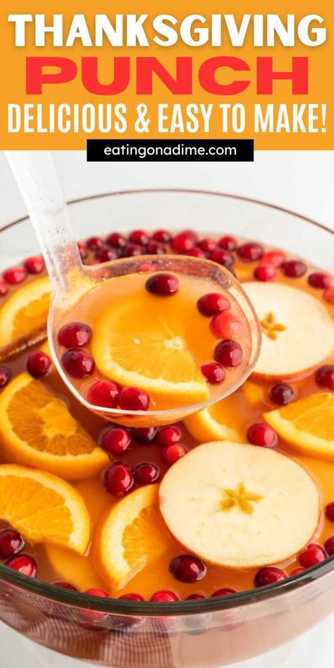 This Homemade Thanksgiving Punch is perfect to serve with your Thanksgiving dinner. It is full of fall flavors and is made with simple ingredients. This punch can be made in a variety of ways. Serve this Thanksgiving punch in fun glasses with slices of oranges, fresh cranberries and more. The best fall drink to serve this holiday season. #eatingonadime #thanksgivingpunchrecipe #punch Jingle Juice Recipe, Thanksgiving Drinks Non Alcoholic, Fall Punch Recipes, Thanksgiving Punch, Cranberry Punch, Fun Glasses, Alcoholic Punch Recipes, Thanksgiving Baking, Non Alcoholic Punch