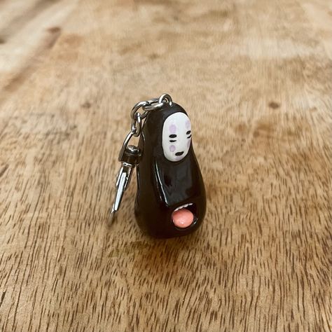 ❣ PRODUCT: Ghibli key ring / Faceless figurine / Made to order figurine / Spirited Away figurine / Handmade figurine / Handmade key ring / Studio Ghibli / Polymer clay key ring ❣ PLEASE READ DESCRIPTION FOR MORE INFORMATION: ❣ Hello to all Studio Ghibli lovers! Add a touch of Ghibli magic to your everyday life with this charming keychain inspired by Faceless! Carefully handcrafted from Fimo clay, this keyring captures the essence of this iconic character from Spirited Away. - Made of quality Fim No Face Ceramic, Studio Ghibli Christmas Ornaments, Ghibli Figurine, Ghibli Polymer Clay, Studio Ghibli Keychain, Clay Key Ring, Studio Ghibli Clay, Ghibli Keychain, Ghibli Clay