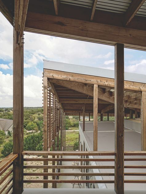 The house features an expansive double roof system. A detached upper roof folds to exploit winds across the hill site, passively forcing extractive cooling, and offering a suitably oriented architectural support for solar photovoltaic panels. It also allowed for the creation of a unique roof deck that overlooks the landscape. Double Roof Design, Multigenerational Living, Co Housing, Photovoltaic Panels, Roof Window, Shed Roof, Roof Structure, Mountain Designs, Windows Exterior