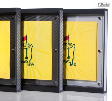 Modern Aluminum Golf Pin Flag Cases Frames, the most modern golf designs available in all aluminum colors with carbon design - MADE IN USA contact ALU DESIGN Golf Golf Flag Display Ideas, Golf Flag Display, Flag Display Ideas, Golf Bedroom, Golf Man Cave, Golf Lounge, Home Golf Simulator, Golf Crafts, Flag Ideas