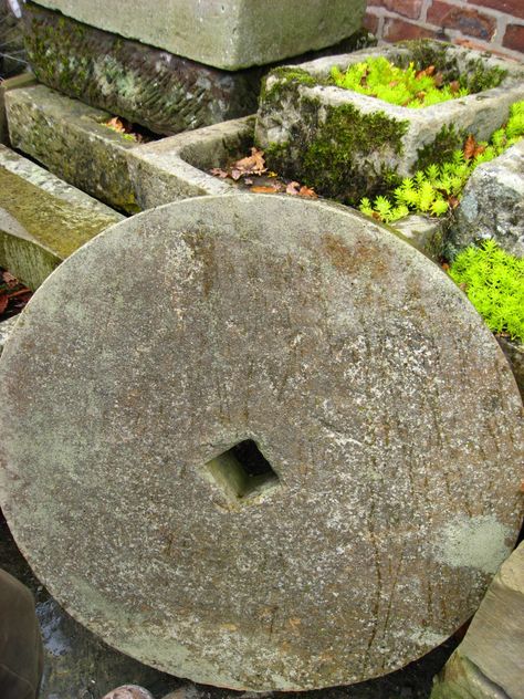 Large antique grinding wheel. Made of grist stone. In very good condition consistent with age and use.     Imported from England. For more information, read our blog on the history of  Millstones . Concrete Inspiration, Primitive Gardens, Mill Stone, England Garden, New England Garden, Old Bridges, Water Wheel, Covered Bridges, Quilting Crafts