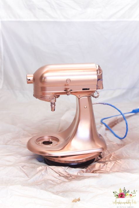 copper spray painted KitchenAid Mixer sitting on top of a turn table in a spray shelter Copper Kitchenaid Mixer, Painted Kitchenaid, Copper Spray Paint, Copper Canisters, Kitchen Aid Recipes, Paint Mixer, Diy Copper, Diy Spray Paint, Copper Work