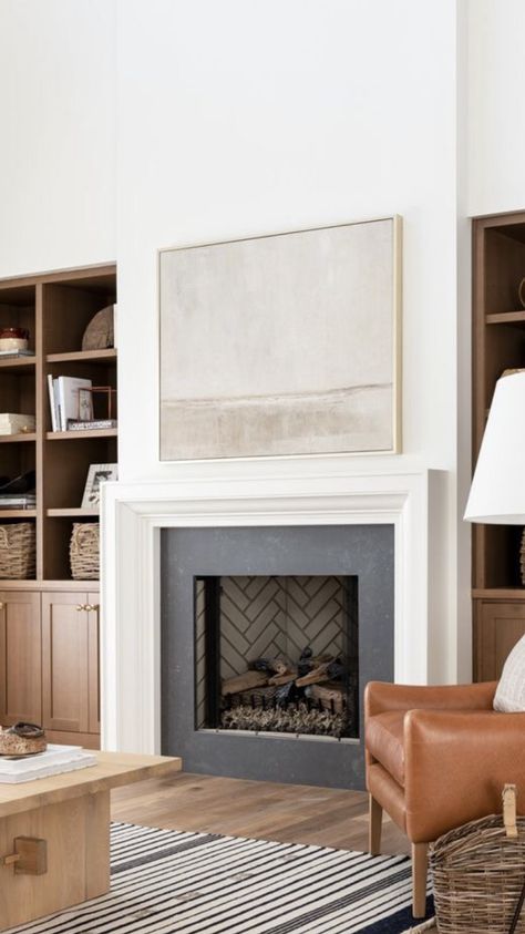 Fireplace Mantel On Brick, Cozy Stone Fireplace Living Rooms, Simple Classic Fireplace, White Stucco Fireplace Spanish Style, Fireplace With Bookcase On One Side, Simple Modern Fireplace Surround, Tiered Fireplace Mantle, Modern Wood Fireplace Mantel, Fireplace Modern Mantle