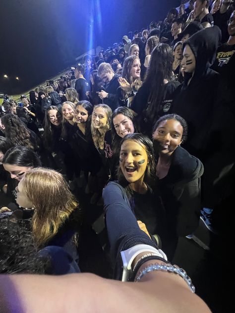 Teenagee girls take a .5 at a black out themed high school football game while it is raining Black Outfits Football Game, Black Out Fnl Theme, Black Out Game Football, Black Out Outfits For Football Games, Black Out Fnl, Black Out Football Game Outfits, Blackout Football Game, Black Out Football Game, Highschool Vibes