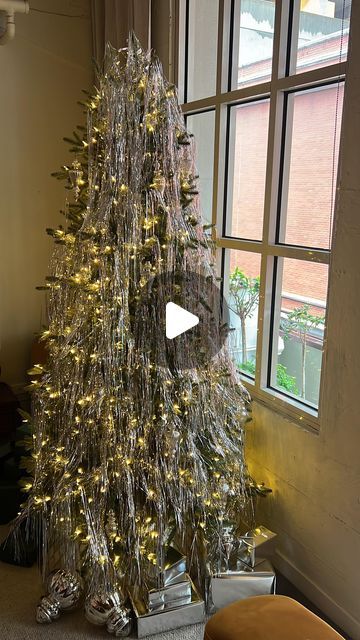 Loui Burke on Instagram: "Easy way to decorate your tree this Christmas or New Year’s using Lametta tinsel! 

A classic throwback style from the 1930s/50s and now today. Be sure to cut it this way so you can save it for years to come! 🎄✨ 

I’ll be welcoming the New Year in style with a bit of glam and sparkle. 
 
#nye#nyeparty#newyearseve#partydecor" Lametta Tinsel Tree, Tensil Trees, Christmas Tree With Tinsel Icicles, How To Add Tinsel To Christmas Tree, Christmas Tree With Tinsel, Tree With Tinsel, Christmas Tree Tinsel, Glam Christmas Tree, Tinsel Christmas Tree