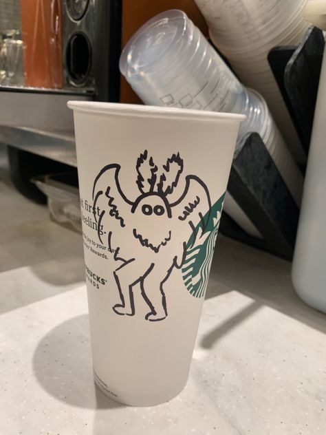 Drawing on Starbucks cups Starbucks Cup Drawing Doodles, Starbucks Cup Art Doodles, Mothman Drawing, Starbucks Cup Drawing, Starbucks Drawing, Cup Drawing, Starbucks Cup Art, Cup Art, College Stuff