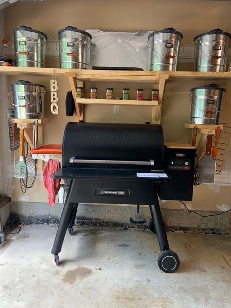 Garage Grill Storage, Garage Grilling Station, Traeger Backyard Setup, Grill Pellet Storage Ideas, Traeger Grill Setup, Grill Organization Ideas, Bbq Utensil Storage, Barrel Smoker, Outdoor Organization