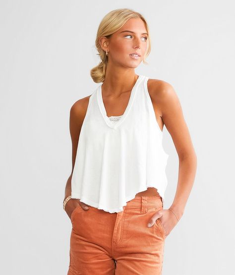 Free People Karri Swing Tank Top - White X-Small, Women's Ivory Raw edge v-neck tank Bust measures 44 1/2 on size small Body length 24 1/2 on size small. 100% Cotton. Machine wash cold with like colors. Use only non-chlorine bleach. Tumble dry low. Low iron as needed. May be dry cleaned.. Measurements: Bust -Fullest part of bust with arms at sides. Waist -Circumference of natural waist: above belly button below rib cage. Hips -Standing with feet together fullest part of hips. WOMEN'S TOP SIZE CO Cut Tank Top, Free People Tank Top, Tank Top For Women, Low Low, Waist Circumference, Rib Cage, Low Iron, White Tank Top, 2 On