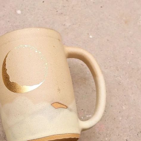 SVEN Ceramics on Instagram: "Pulled these Cashmere beauties out of the kiln yesterday, and photographed them this morning. I'm in love! Not everything is 100% ready, but we'll be making the previews live any moment now, and then taking them down tonight to get everything finalized and tip top before tomorrow's release at noon PST!!! These last few gold lustre mugs are still in the process of getting listed, so not everything is on there yet. But you should get a general idea! Everything will Gold Lustre Pottery, Gold Lustre Ceramics, Celestial Ceramics, Gold Luster Ceramics, Moon Mug, Moon Mugs, Ceramic Moon Mug, Pottery Moon Mug, Kiln