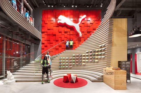 Athletic merchandise from Puma was a common substitute during the Nike boycott of 2015. Retail Branding, Puma Store, Retail Space Design, Retail Interior Design, Retail Inspiration, Bedroom Door Design, Retail Concepts, Store Interiors, Retail Store Design