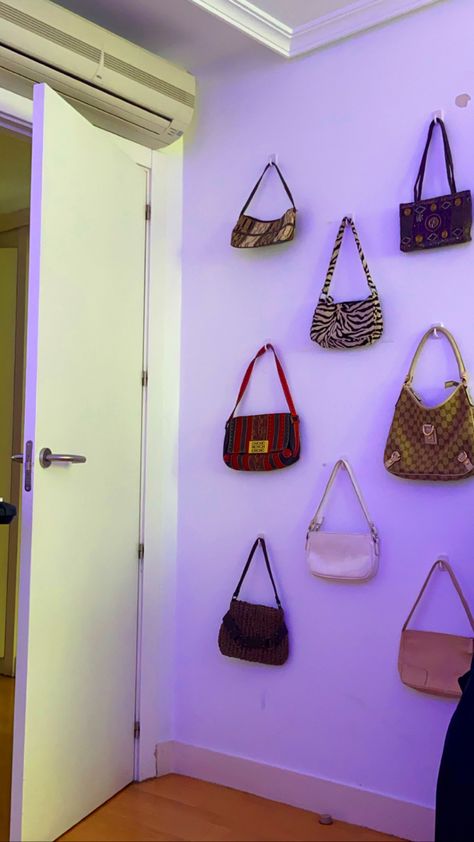 Purses On Wall Aesthetic, How To Hang Bags In Room, Purses Hanging On Wall, Purse Wall Display Bedroom, Bag Wall Display, Purses On Wall, Purse Organization Wall, Purse Wall Display, Bag Display Ideas Bedroom