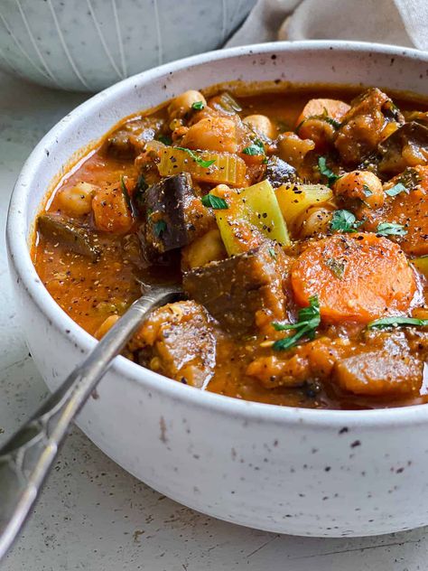 This Eggplant Stew is packed with flavor, fiber, & plant-based protein but made entirely of affordable kitchen staples! So easy to make and perfect for a weeknight comfort meal! #plantbasedonabudget #eggplant #stew Guyana Recipes, Stew With Tomatoes, Eggplant Stew, New Recipes For Dinner, Kitchen Staples, Affordable Kitchen, Chickpea Stew, Eggplant Recipes, Garbanzo Beans