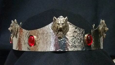 Made by Baron Randwulf -  20 ga. stainless steel coronet that has been peened. It has red pearl Cabochon's set in brass bezels and brass cast wolf heads Wolf Crown, Daenerys And Jon, Medieval Crown, Aegon Targaryen, Fantasy Kingdom, Cersei And Jaime, Robb Stark, Margaery Tyrell, Helmet Hat