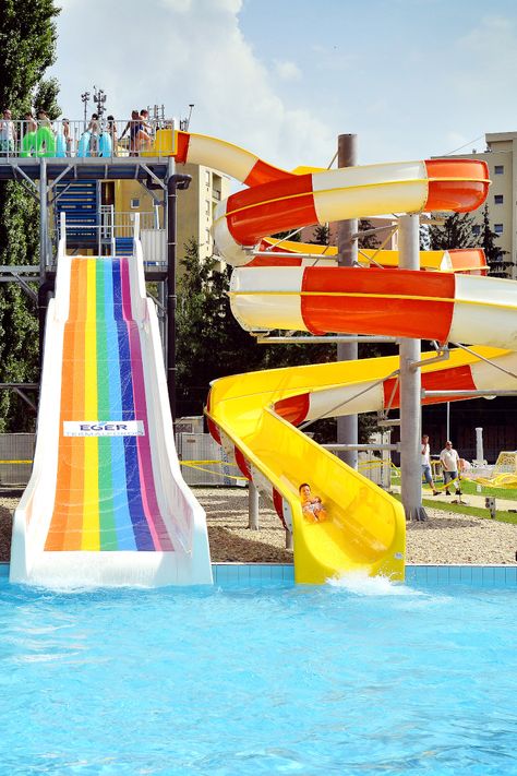 Two bright slides at the Thermal Spa of Eger. As you can see the wide water slide also has a logo printed on it. This is a nice customisation option that we can recommend on Wide Slides.  #waterslides #sunny #summer Big Water Slides, Water Park Rides, Indoor Pool House, Swimming World, Pool Party Kids, Auction Projects, Thermal Spa, Water Parks, Fun Places To Go