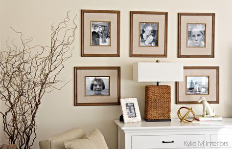 Family photo gallery wall beside the TV. Home Decor and Benjamin Moore Gentle Cream walls Benjamin Moore Gentle Cream, Wall Colors With Oak Cabinets, Benjamin Moore Paint Colours, Family Photo Gallery Wall, Barely Beige, Warm Neutral Paint Colors, Cream Paint Colors, Photo Wall Gallery, Kitchen Wall Colors