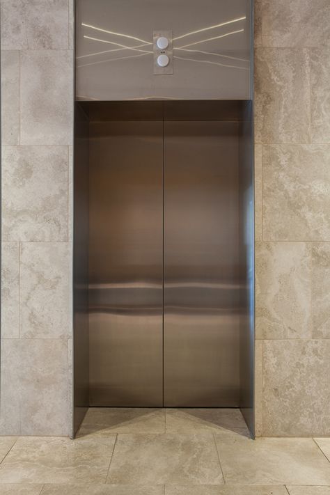 Elevator Door Design Modern, Bronze Elevator Door, Lift Door Design Elevator Lobby, Lift Cladding Design Residential, Lift Wall Cladding Design Granite, Lift Front Wall Design, Lift Door Design, Lift Wall Design, Elevator Door Design