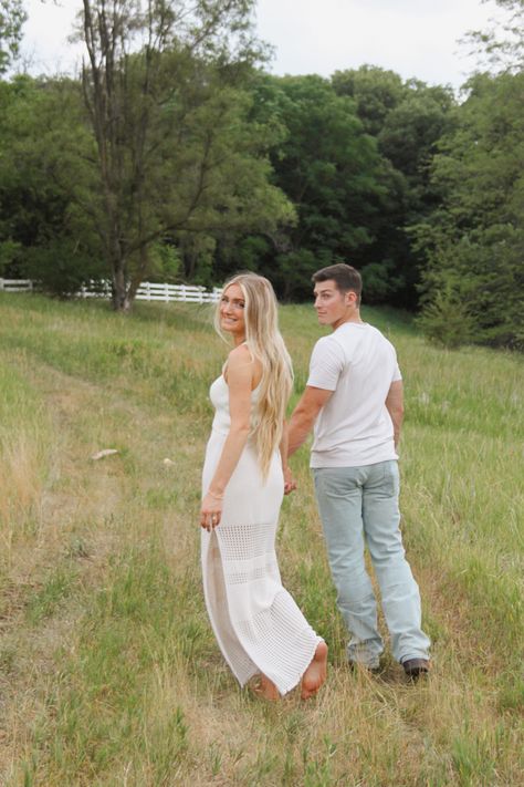 Engagement photos in a field was the best idea! White skirt, jeans and boots, and white shirts- it all was a dream come true! White And Jeans Engagement Photos, White Shirt Jeans Engagement Photos, Engagement Photos White Top And Jeans, Jean And White Shirt Engagement, White Cowboy Boots Engagement Photos, Field Engagement Photos, White Shirts, White Skirts, Jeans And Boots