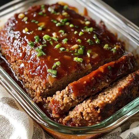 Meatloaf is one of those classic comfort foods that brings warmth and nostalgia to the dinner table. This Sweet and Savory Brown Sugar Meatloaf elevates Meatloaf Recipes With Brown Sugar, Meatloaf Glaze Recipes, Meatloaf With Brown Gravy, Meatloaf With Brown Sugar, Meatloaf Gravy, Brown Gravy Meatloaf, Brown Sugar Meatloaf, Moist Meatloaf, Brown Sugar Glaze