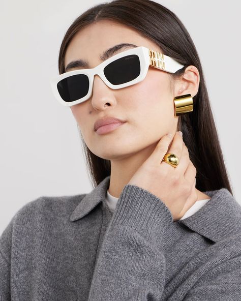 M I U M I U ^ DETAILS & CARE • White acetate • Come with a case • 100% UV protection Miu Miu Eyewear, Statement Sunglasses, Miu Miu Sunglasses, Eyewear Trends, White Sunglasses, Sunglasses Collection, White Accessories, Butterfly Sunglasses, Acetate Sunglasses