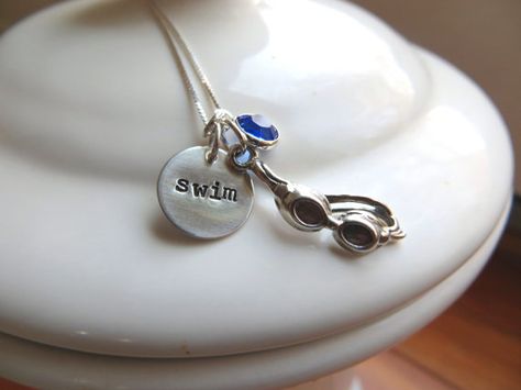 Silver swimmer necklace with sterling silver hand stamped "swim" charm, swim goggles charm and Swarovski birthstone crystal of your choice i love this Swim Jewelry, I Love Swimming, Swimmers Life, Swim Life, Swimming Quotes, Swim Mom, Synchronized Swimming, Competitive Swimming, Swim Goggles