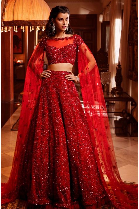 Red hand embroidered lehenga set with draped sleeves Luxury Lace Work Choli For Diwali, Luxury Anarkali Lehenga For Diwali, Luxury Festive Lehenga For Diwali, Luxury V-neck Lehenga For Diwali, Luxury Bollywood V-neck Lehenga, Luxury Anarkali Lehenga With Fitted Bodice, Luxury Red Anarkali Lehenga, Luxury Festive Flared Lehenga, Luxury Lace Lehenga For Diwali