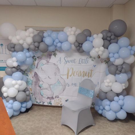 Balloon Garland made for a friend's baby shower at work!! Theme: A Little Peanut is on the way!! #APeanutisontheway #balloongarland #balloons #balloondecoration #balloonartist #balloonart #ATC #AllThingsCherished #craftmom #craftgrandma #craftlife #blessedandgrateful #babyshower #itsaboy A Little Peanut Is On The Way, Little Peanut Baby Shower Ideas, Our Little Peanut Baby Shower Theme, Elephant Theme Balloon Garland, Little Peanut Baby Shower Boy, Blue Elephant Baby Shower, Baby Shower Balloon Arch, Elephant Baby Shower, Balloon Art