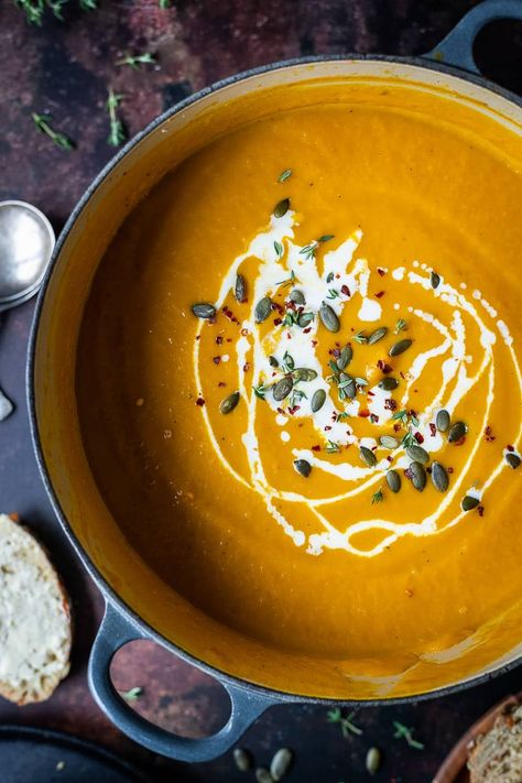 Spiced carrot and pumpkin soup - this delicious, warming vegan soup is easy to make and the perfect meal for Autumn. It is hearty and comforting and sure to become a family favourite you will want to make on repeat throughout the colder months. #vegan #veganmeal #vegansoup #plantbased #healthy #pumpkin Best Soup Ever, Pumpkin And Ginger Soup, Spiced Pumpkin Soup, Root Vegetable Soup, Carrot And Coriander Soup, Vegan Pumpkin Soup, Best Soup, Spiced Carrots, Carrot Ginger Soup