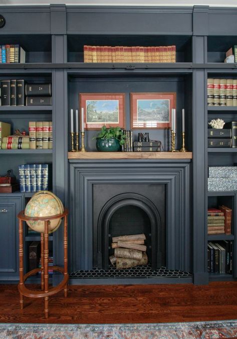 A House in the Woods. dark painted fireplace Herringbone Patio, Fearless Wallpaper, Cane Cabinet, Library With Fireplace, Alcove Cupboards, Southern Home Interior, Casa Loft, Fireplace Built Ins, Library Room