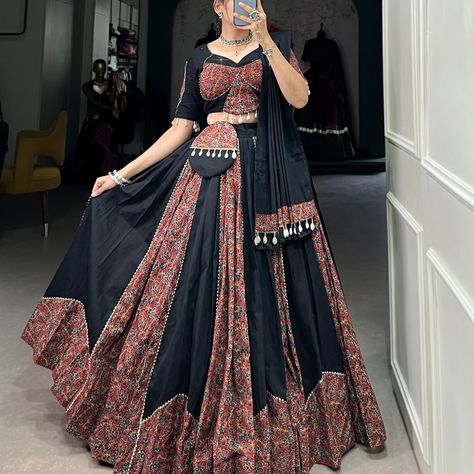 Radiate Festive Charm with Our Plain and Printed Navratri Lehenga, Complete with Gota Patti Accents, Unique Blouse Design, and Stunning Original Mirror Hand Work Dupatta ♠️ ll280l Lehenga (Stitched) Lehenga Fabric : Pure Cotton Lehenga Work : Plain With Printed And Gota Patti Touch Up Lehenga Waist : Support Up To 42 Lehenga Closer : Drawstring With Zip Stitching : Stitched With Canvas And Full Inner Length : 41 Flair : 6 Meter Inner : Micro Cotton Blouse (Stitched) Blouse Fabric : Pure C... Lehenga Plain, Cotton Chaniya Choli, Mirror Work Lace, Chaniya Choli Designs, Crop Top Lehenga, Cotton Lehenga, Traditional Gowns, Navratri Festival, Navratri Chaniya Choli