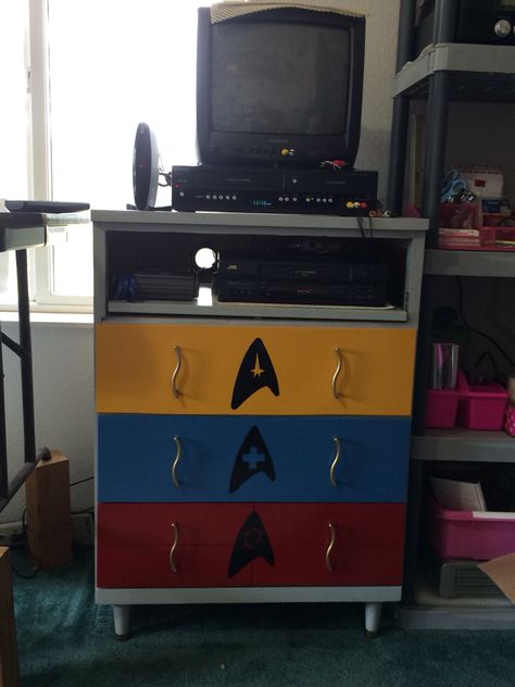 Star Trek entertainment center my husband made out of an old dresser. Trektacular Star Trek Room Decor, Star Trek Bedroom Ideas, Star Trek Nursery, Primary School Displays, Star Trek Decor, Sci Fi Room, Galaxy Bedroom, Star Trek Theme, Music Furniture