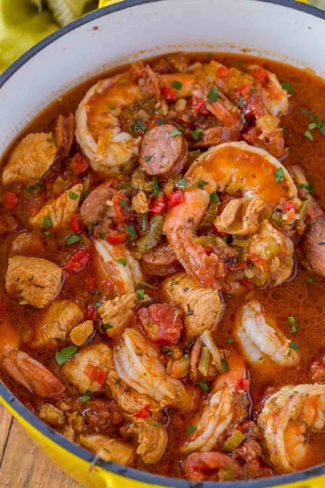 Easy Jambalaya made with Chicken, Shrimp and Andouille Sausage in under 45 minutes. Served over rice or rice cooked with the jambalaya for one pot meal. | #jambalaya #cajun #cajunrecipes #dinnerthendesert #onepot #easyrecipes #stew #shrimp #sausage #chicken #dinner #weeknight #quickrecipes Cajun Jambalaya Recipe, Shrimp And Andouille Sausage, Easy Jambalaya, Recipe With Shrimp, Gumbo Recipe Easy, Jambalaya Recipe Easy, Seafood Gumbo Recipe, Slow Cooker Jambalaya, Cajun Jambalaya