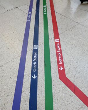 3.Graphic information that is presented on the floor or the ground; the area where the signage was put is very interesting and the bold colors draw attention from people and they can easily follow the lines because of the color coding. Floor Signage, Victoria Station London, Hospital Signage, Wayfinding Signage Design, Wayfinding Signs, Floor Graphics, Directional Signage, Wayfinding Design, Victoria Station