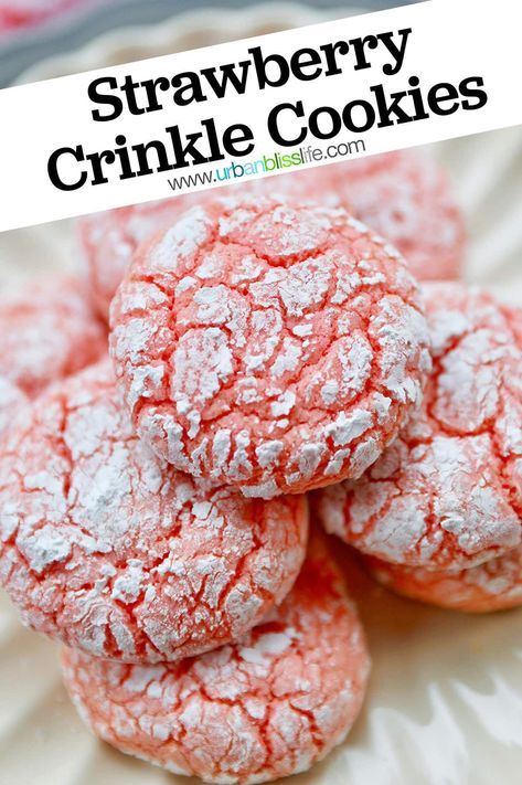 These colorful pastel pink Strawberry Crinkle Cookies are fast & easy to make with 4 ingredients! Perfect for Valentine's Day, Easter, picnics, and birthdays! Get the full recipe with baking tips at UrbanBlissLife.com #Cookies #StrawberryCookies #CrinkleCookies #Baking Cake Mix Crinkle Cookies Cool Whip, Crackle Cookies Cake Mix Recipe, Cake Cool Whip Cookies, Cool Whip Cookies Recipe, Cool Whip Recipes Easy, Best Soft Cookies, Xmas Cookies Easy, Easy Xmas Cookies, Crinkle Cookies Recipe Cake Mixes