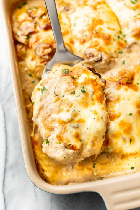 This is the best recipe for Chicken Gloria! This creamy chicken mushroom casserole has an irresistible sherry cream sauce, mushrooms, and melty Muenster cheese. It's perfect for entertaining! Chicken Gloria Casserole, Chicken Gloria, Chicken Breast Casserole Recipes, V Neck Bridesmaid Dress, Cheesy Chicken Recipes, Creamy Chicken Casserole, Chicken Breast Recipes Baked, Dresses For Weddings, Chicken Entrees