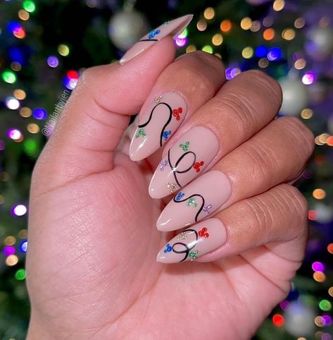 Posted by Zoe Scott: Welcome, sn this post, we're exploring 20 captivating Christmas Lights Nail Designs for this holiday season, perfect for adding festive flair to your ... Save For Disney, Holiday Nail Inspo, Disney Christmas Nails, Christmas Tree Nails, Essie Nail Colors, Candy Cane Nails, Statement Nail, Christmas Gel, Tree Nails