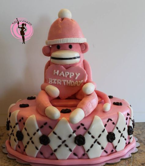 Pink Sock Monkey Cake Pink Monkey Cake, Monkey Theme Birthday Cake, Monkey Cake Design, Monkey Birthday Cake Ideas, Monkey Cakes, Sock Monkey Birthday, Monkey Cake, Sock Monkeys, Spring Birthday