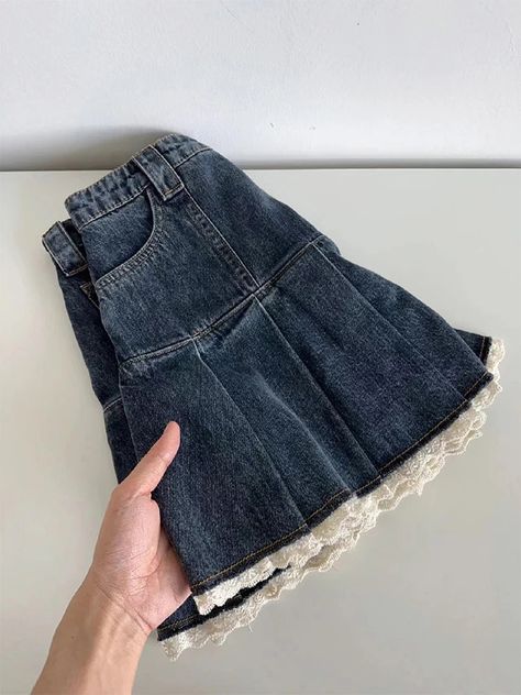 Get ready to turn heads with our Lace Trim Pleated Denim Mini Skort! This classic skort is the perfect addition to any girly wardrobe. With its flirty pleated denim skirt and delicate lace trim, it's sure to add a fun and playful touch to any outfit. Elevate your style game with this must-have piece. Size Chart: Size Waist (cm) Hip (cm) Length (cm) Waist (in) Hip (in) Length (in) S 64 92 37 25.20 36.22 14.57 M 68 96 38 26.77 37.80 14.96 L 72 100 39 28.35 39.37 15.35 XL 76 104 40 29.92 40.94 15.7 Mini Skirt Aesthetic, Corduroy Skirt Outfit, Skirts Y2k, Retro Kawaii, Pleated Denim Skirt, Mini Skirt Fashion, Korean Skirt, Skirt Streetwear, A Line Denim Skirt