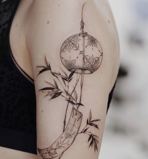 Norigae Tattoo Black, Taiwanese Tattoo Design, Delicate Japanese Tattoo, Wind Chime Tattoo Ideas, Japanese Windchime Tattoo, Fine Line Chinese Tattoo, Japanese Wind Chimes Tattoo, Asian Inspired Tattoos For Women, Japanese Ornament Tattoo