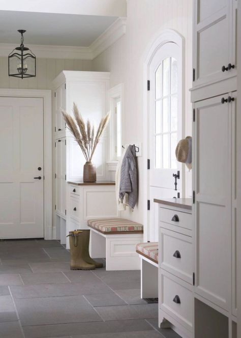 This beautiful Dutch Colonial home was designed for a family of five by Mackin Architects, located in the coastal community of Rye, New York, on the Long Island Sound. Transitional Mudroom, Transitional Entry, Dark Wooden Floor, Dutch Colonial Homes, Mudroom Flooring, Farmhouse Entry, Mudroom Design, Dutch Colonial, Entry Way Design